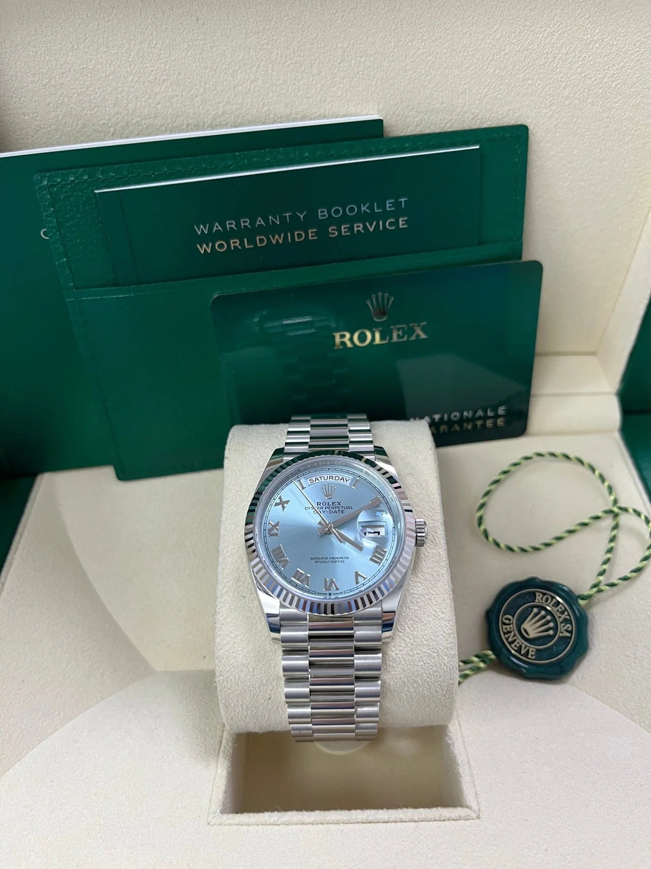 Rolex Day-Date 36 Platinum – Ice Blue Roman Dial – Fluted Bezel (Ref. 128236)